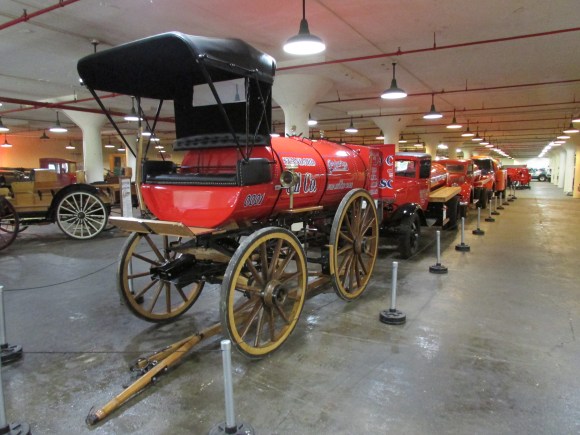 A horse drawn fuel tanker.